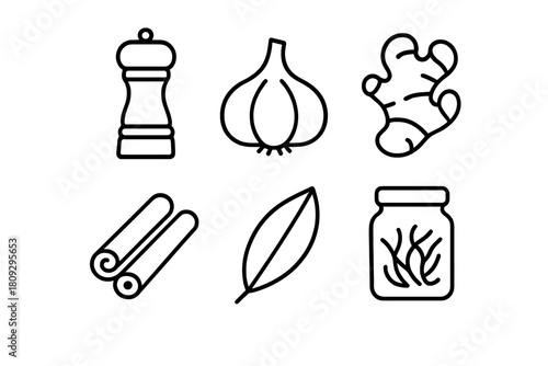 Essential cooking spices and seasoning ingredients including garlic, ginger, and cinnamon