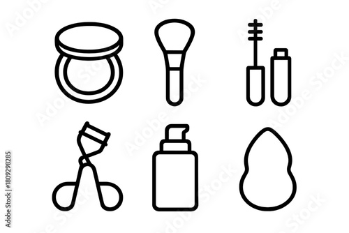 Essential beauty and cosmetic tools featuring makeup brush, powder compact, mascara, and sponge