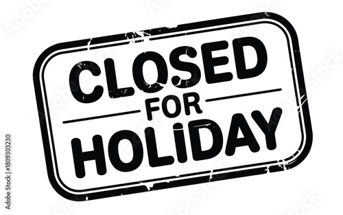Black and white sign indicating a business is closed for a holiday