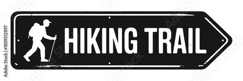 Black and white hiking trail sign with arrow and hiker icon