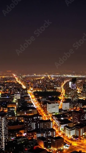Wallpaper Mural Evening city skyline illuminated brightly, Cityscape glowing with lamps and lit windows at night, City skyline shines brightly with street lamps and illuminated buildings during dusk Torontodigital.ca