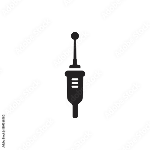 Minimal black dental drill with round head and straight handle on white background