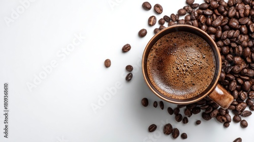 Aromatic Coffee Cup Surrounded by Roasted Coffee Beans on White Background.