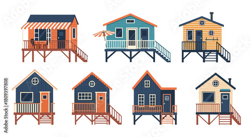 Collection of various colorful wooden beach houses or stilt houses in different designs and colors isolated on white background.