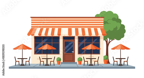 Charming storefront of a small cafe or restaurant with an orange striped awning outdoor tables and umbrellas on the sidewalk.