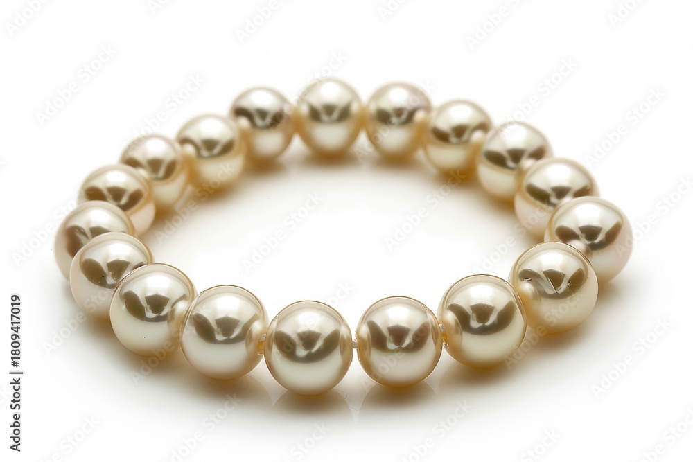 Fototapeta premium Elegant Pearl Bracelet Isolated on White Background for Timeless Luxury Showcase