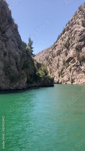 View of the lake with green water and on the mountain cliffs of the Green Canyon. Manavgat, Antalya, Turkey
