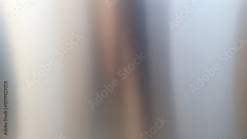 couter. Metal surface transitioning from rough matte to glossy finish with light reflections. safety posters, maintenance manuals, designed for precision metalworking and fabrication facilities.