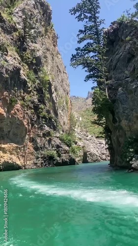 View of the lake with green water and on the mountain cliffs of the Green Canyon. Manavgat, Antalya, Turkey
