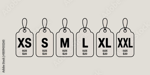 Clothing size tags xs s m l xl xxl in a row