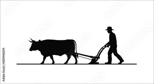 A silhouette of a farmer plowing a field with an ox