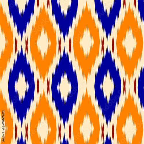 Seamless Ikat ethnic pattern vector. Traditional Thai Mudmee silk fabric style background for textile design.