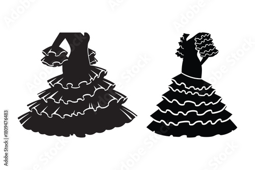 Two black flamenco dresses with ruffled skirts and sleeves