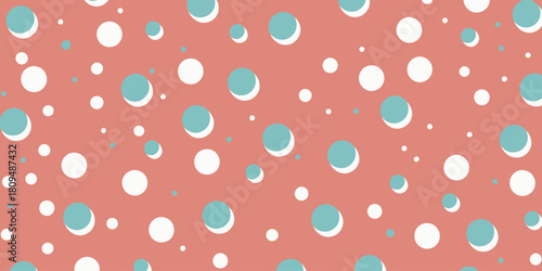 A seamless pattern with white and blue circles on a salmon colored background in a repeating arrangement