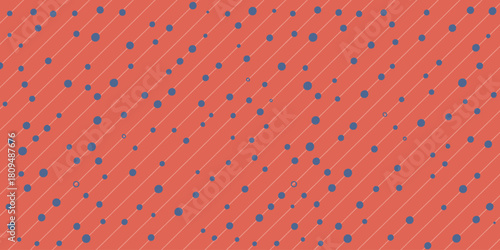 A repeating pattern of blue polka dots and light orange diagonal stripes on a coral background design