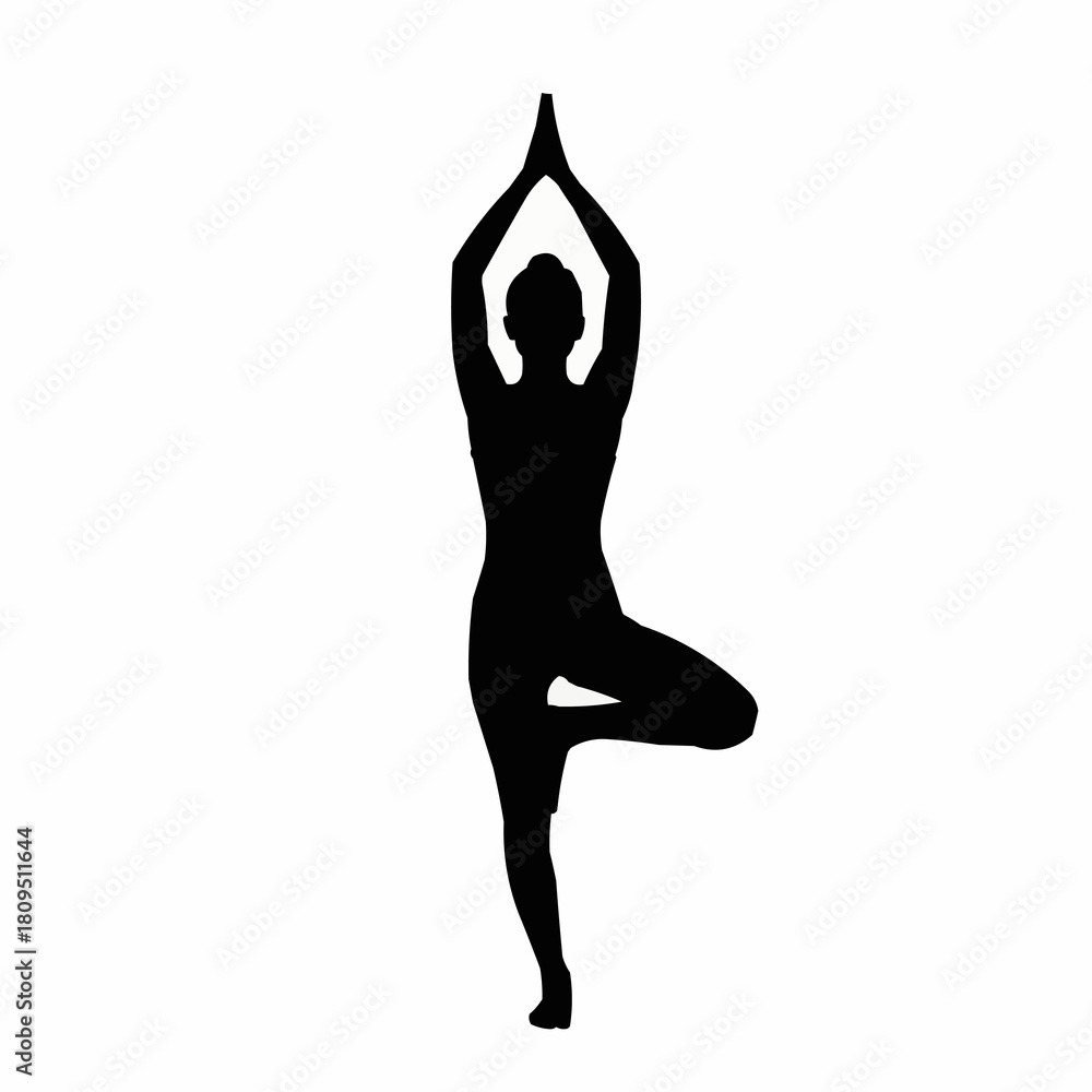 Fototapeta premium Silhouette of a woman in a yoga tree pose, balancing and focused.