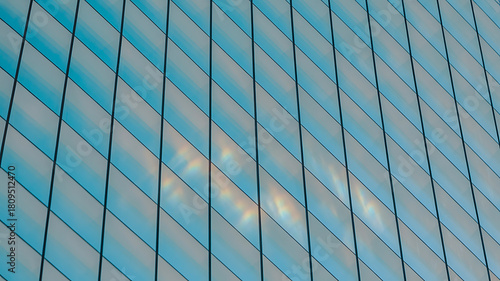 Wallpaper Mural Abstract architectural detail with diagonal glass panels and rainbow light reflections Torontodigital.ca