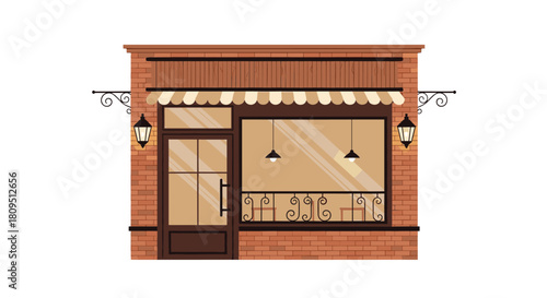 Classic brick storefront facade with a striped awning a large display window and vintage wall lamps for a cozy shop.