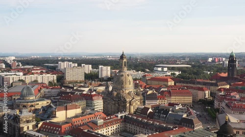 Wallpaper Mural Aerial view of the majestic Frauenkirche rising above terracotta rooftops, a symphony of textures and tones blending seamlessly, Dresden, Saxony, Germany. Torontodigital.ca