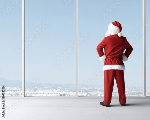 Christmas Santa Claus Boss Business Concept,Christmas santa boss standing modern office window overlooking winter cityscape business holiday