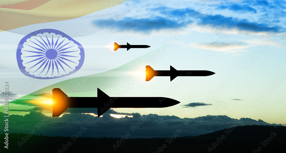 Obraz premium Fired missiles fly to the target. Missiles at the sky at sunset with Indian flag. Missile defense, a system of salvo fire.