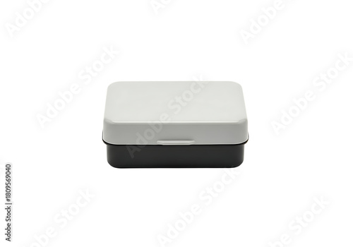 Small rectangular storage box with light gray lid and dark base isolated on transparent background