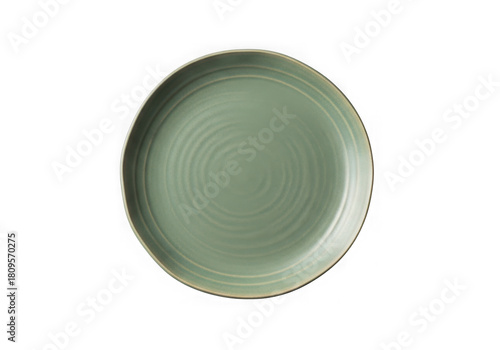 Top view of a round, sage green ceramic plate with concentric ring detail isolated on transparent background