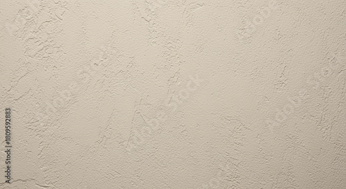 Subtle cream textured wall surface with natural plaster pattern for modern minimalistic interior and architectural background design