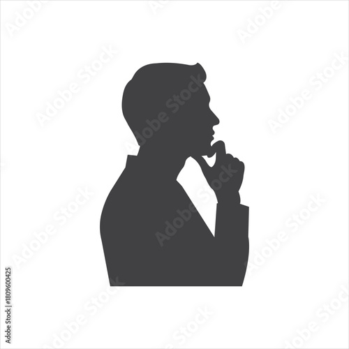 A thoughtful businessman in deep contemplation pondering a critical decision for the future with a monochrome silhouette