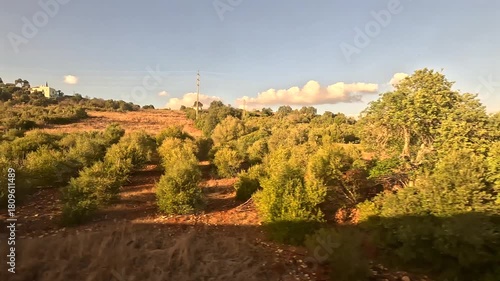 Train Approaching Albufeira Field View from Passenger Seat Window Train Ride Algarve Faro Region Southern Nature Portugal Landscape Sunny Day in November 4K Footage
