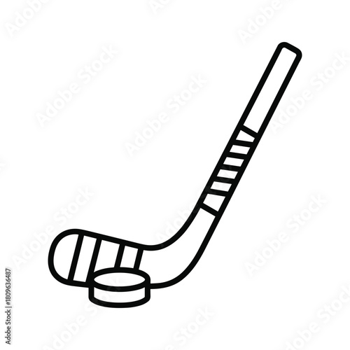 Hockey stick and puck isolated on sport equipment for winter game and activity