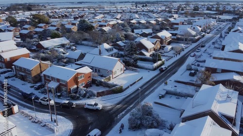 Wallpaper Mural Drone 50fps. UK village, houses, rooftops covered in snow. Icy winter, Christmas season. Torontodigital.ca