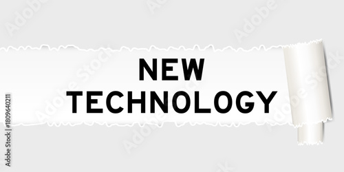 Ripped gray paper background that have word new technology under torn part