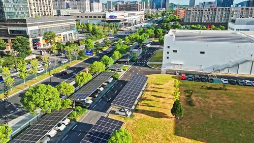 Urban Rooftop Solar Panels on Modern Buildings - Aerial City View