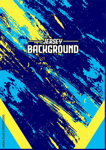 Strong blue jersey featuring bold yellow brush splashes creating fast energetic movement.