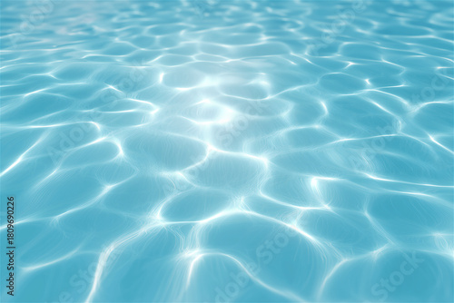 Clear turquoise water surface with bright sunlight reflections creating a calm, refreshing and tranquil summer atmosphere, ideal for backgrounds, wellness concepts and serene natural themes.