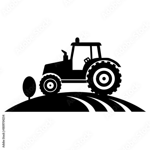 Silhouette of an agricultural tractor cultivating a field with a small tree Vector