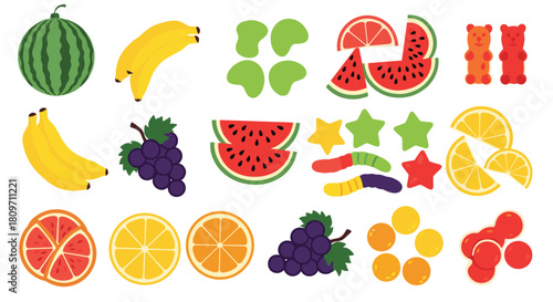 A colorful collection of various fruit-shaped gummy candies including watermelon bananas grapes and citrus slices along with gummy bears and worms.