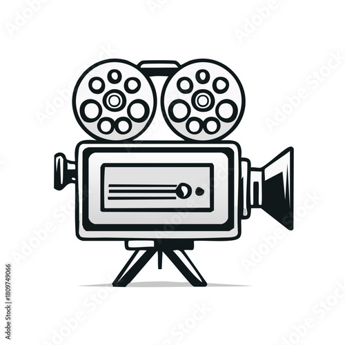 Vintage movie camera with film reels and tripod