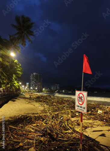 Rainy season storm damage on Nha Trang beach with 