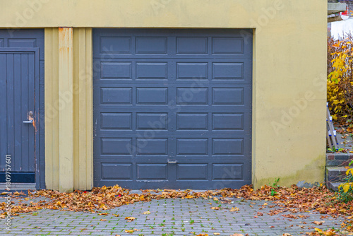 Automated Garage Door at House in Norway Autumn Day