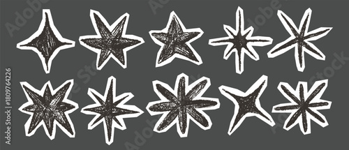 Doodle starburst and star paper cutout in irregular scrapbook set. Stars shape hand drawn in chalk. Doodle star sketch drawing. Design elements