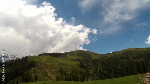 Wallpaper Mural Timelapse of Clouds Sweeping Lush Green Meadows Torontodigital.ca
