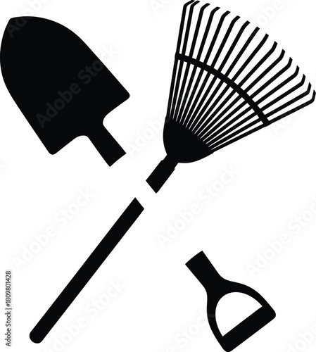 Black garden tools, shovel, rake