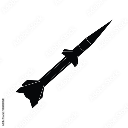 A black silhouette of a missile flying through the air isolated on