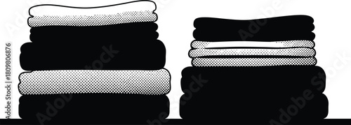 Stacked monochrome folded laundry with halftone pattern, domestic chores