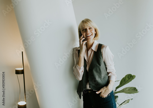 Woman smiling while talking...