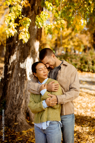 Couple enjoying a warm embr...