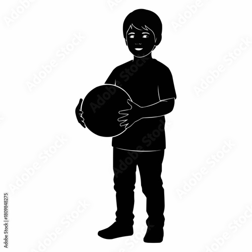 Boy holding a ball, ready to play, looking forward to the game, happy and excited.