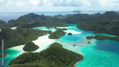 Raja Ampat, Indonesia: Aerial drone footage of the famous wayag viewpoint plateform overlooking a stunning lagoon in in Raja Ampat in west Papua in Indonesia.